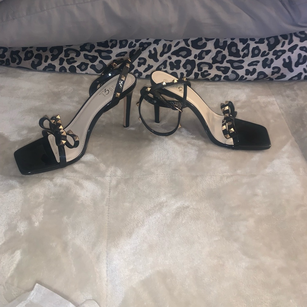Strappy black heel with grommets ***FITS LIKE A SIZE 11***